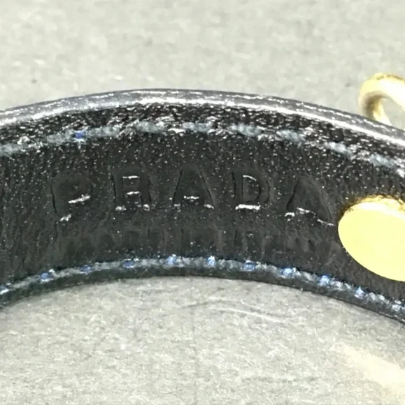Black■DetailsA pre-owned .PRADA Saffiano Leather Bell Motif Bangle Bracelet/8 - Picture 7 of 8